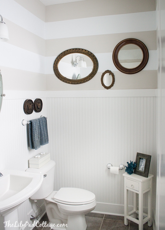 A bathroom with striped walls