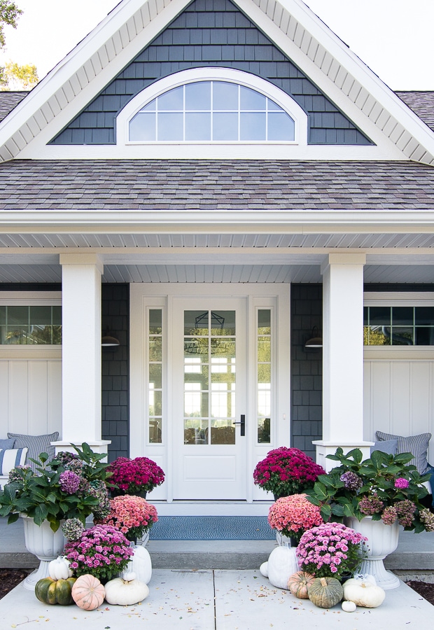 Hydrangeas in planters on a front porch