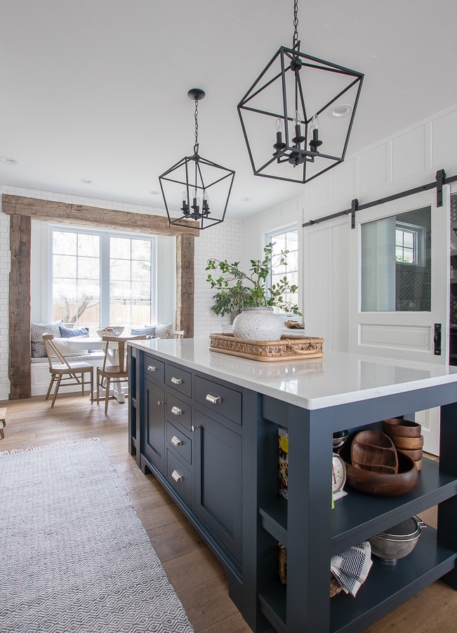 A kitchen island with a  large window