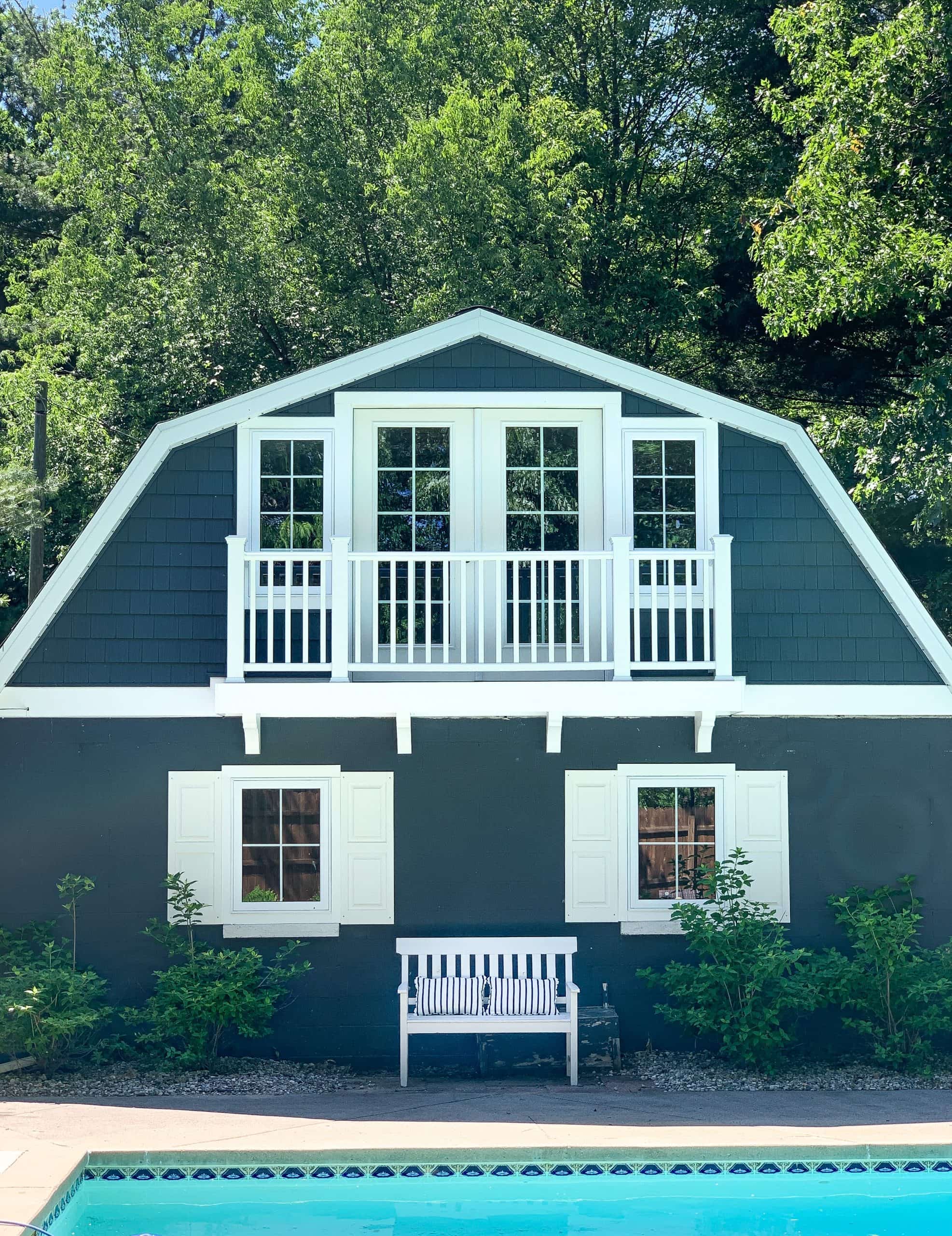 A house with trees in the background