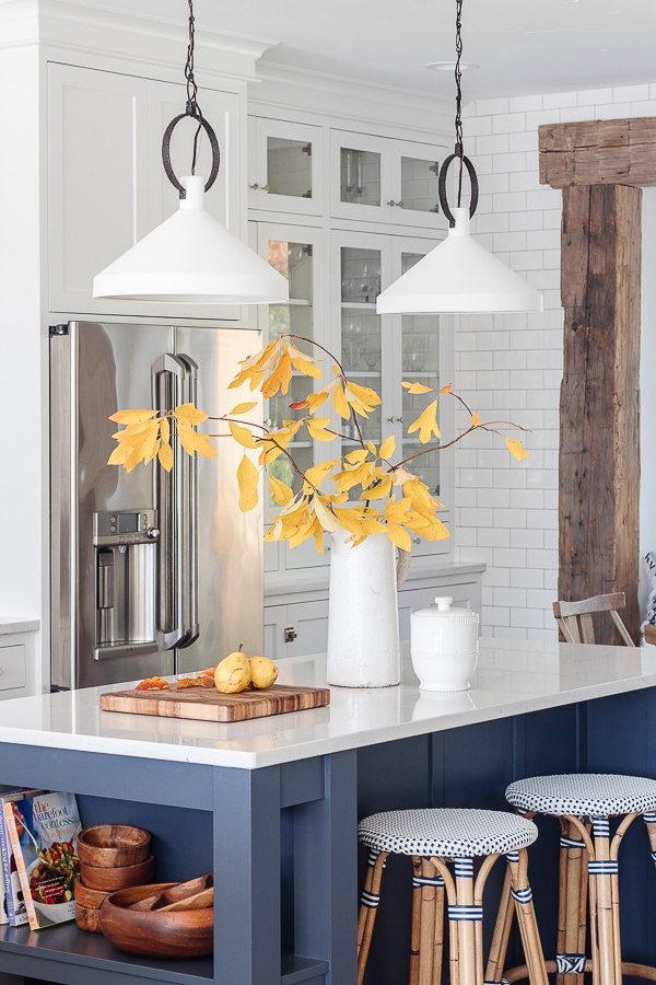 white pendant lights, navy island