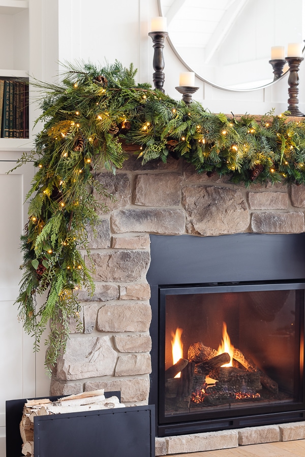 A fire place with garland 