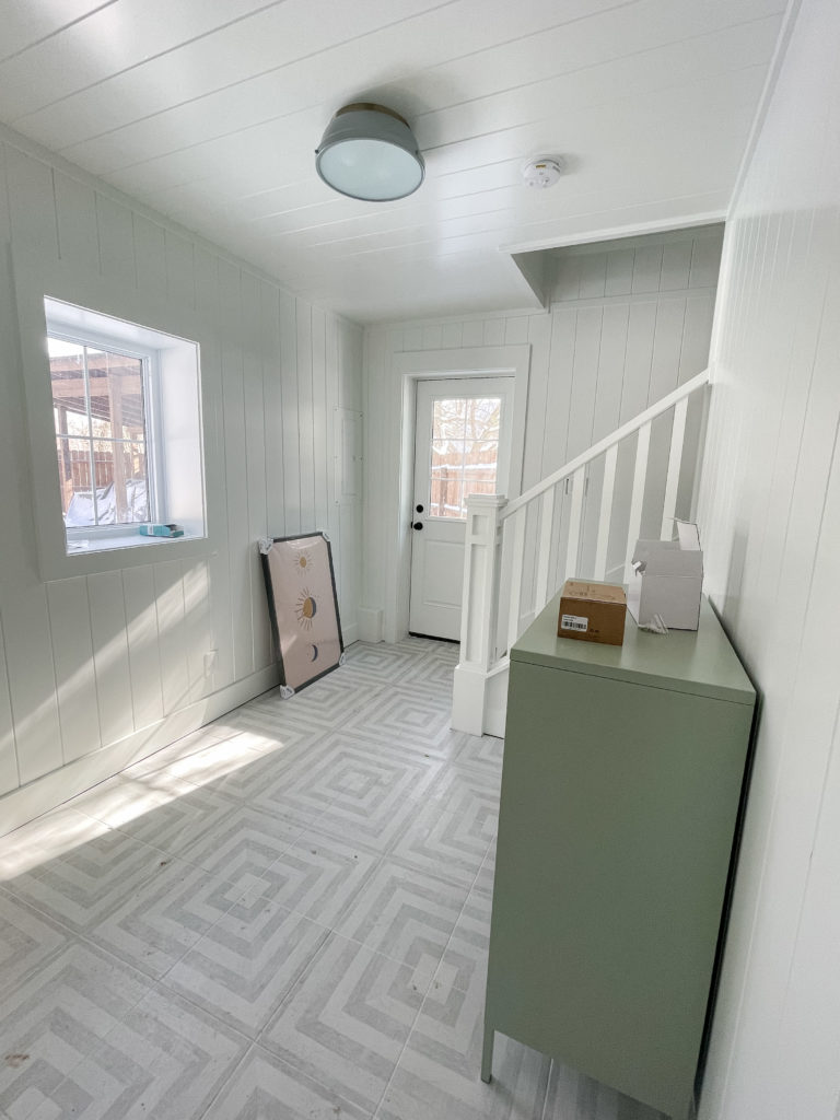 gray and white patterned pool house tile white planked walls