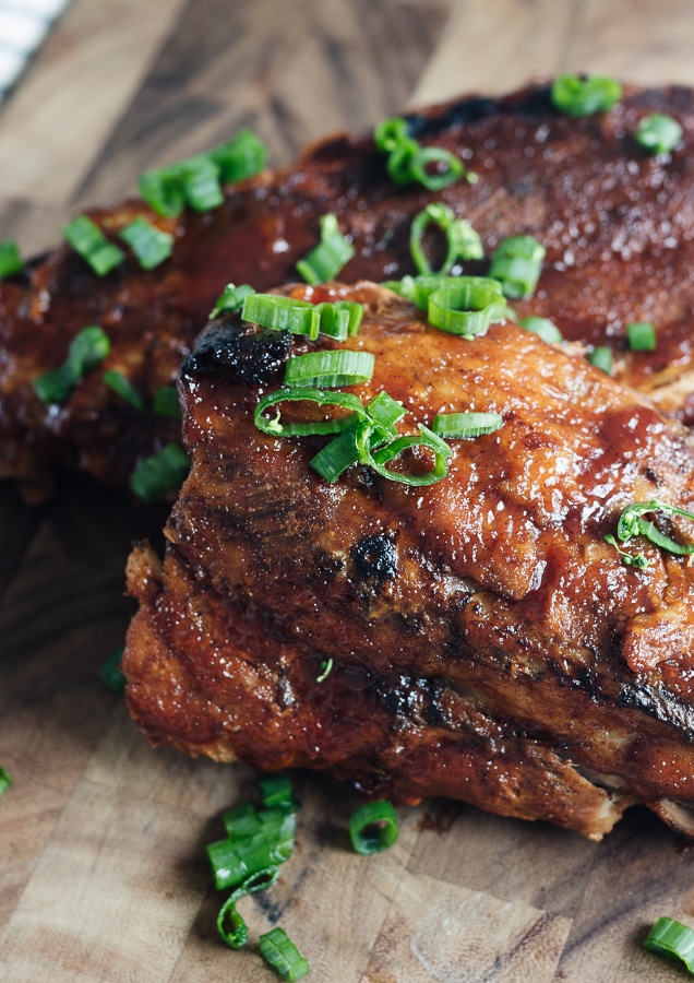 picture of pork ribs with bbq sauce and scallions