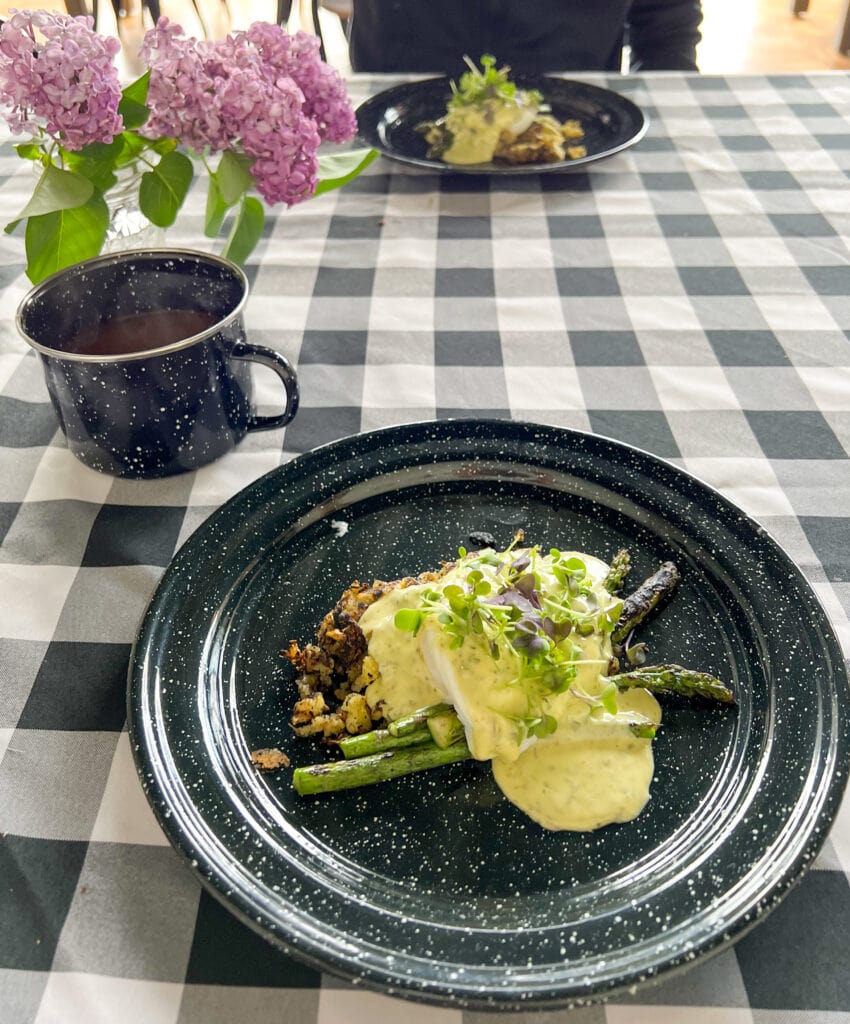 eggs and asparagus on a blue plate