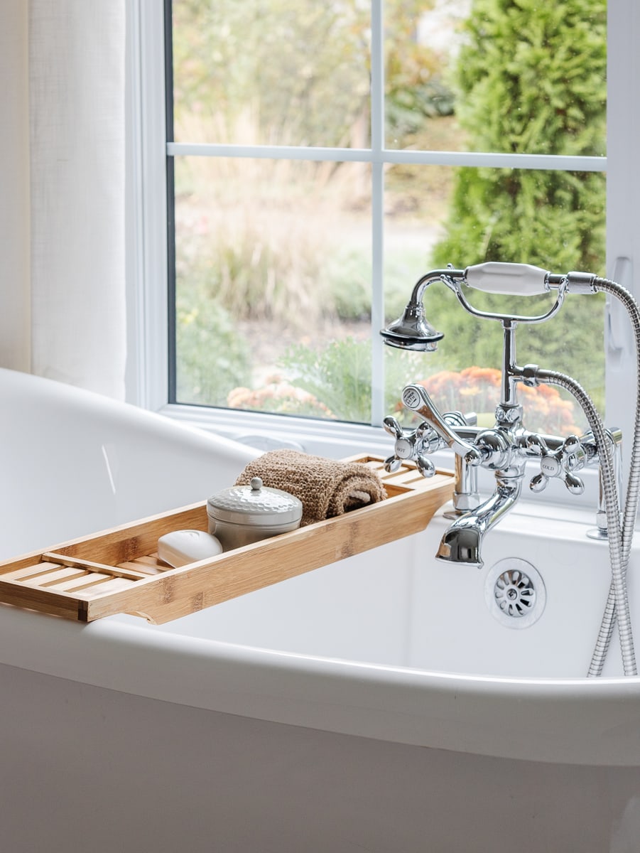 bathtub with bamboo tray