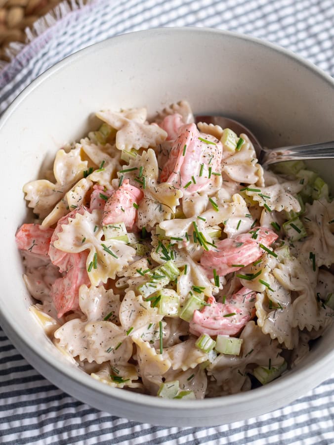 white bowl filled with pasta and shrimp